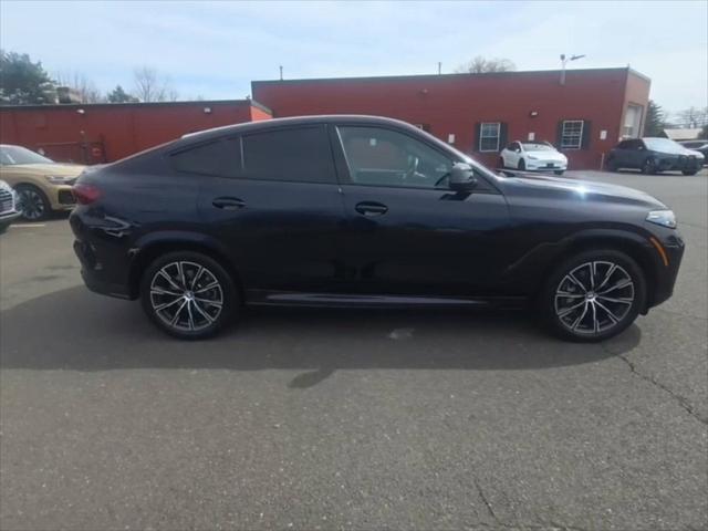 used 2024 BMW X6 car, priced at $67,445