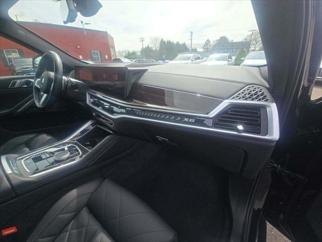 used 2024 BMW X6 car, priced at $67,445