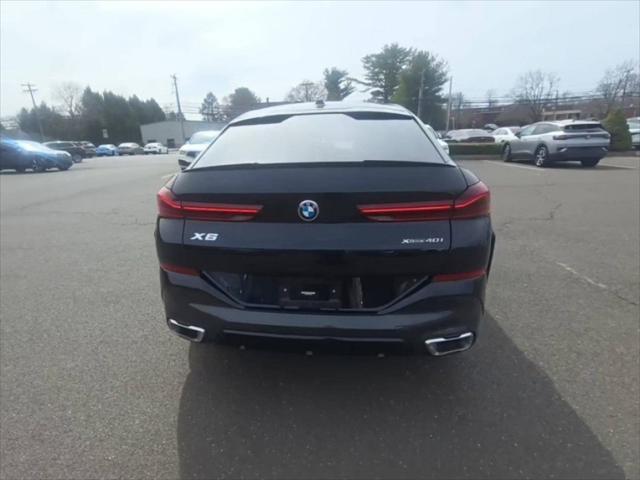 used 2024 BMW X6 car, priced at $67,445