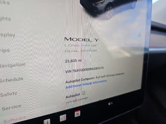 used 2024 Tesla Model Y car, priced at $33,445