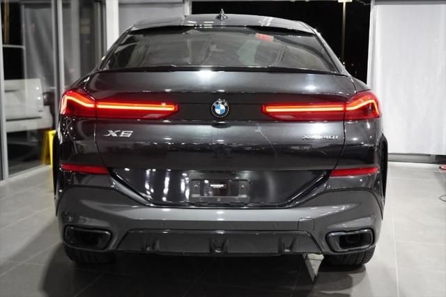 used 2022 BMW X6 car, priced at $55,445