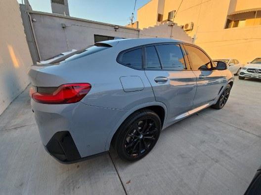 used 2023 BMW X4 car, priced at $50,885