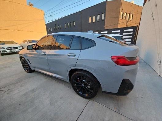 used 2023 BMW X4 car, priced at $50,885