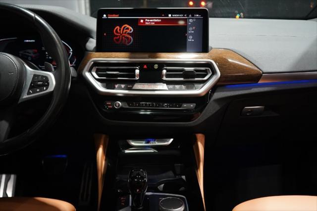 used 2023 BMW X4 car, priced at $47,650
