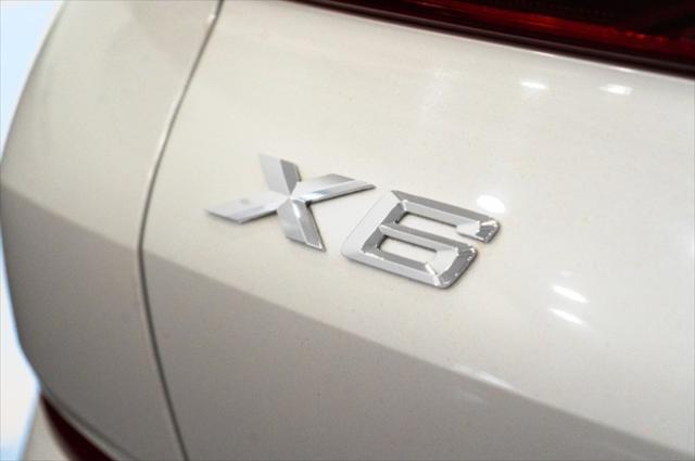 used 2021 BMW X6 car, priced at $37,050