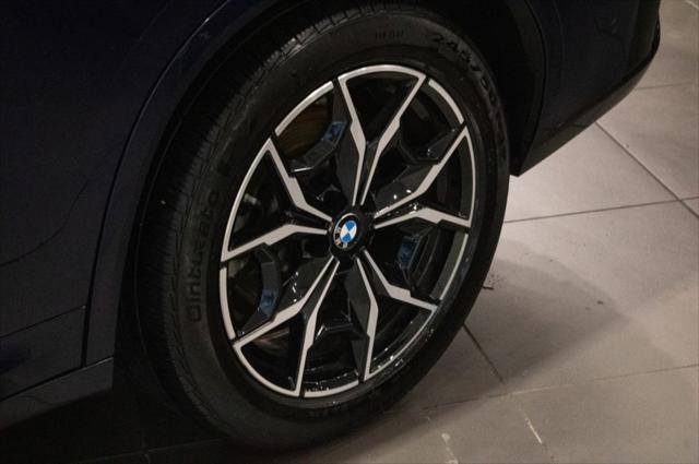 used 2022 BMW X4 car, priced at $34,135