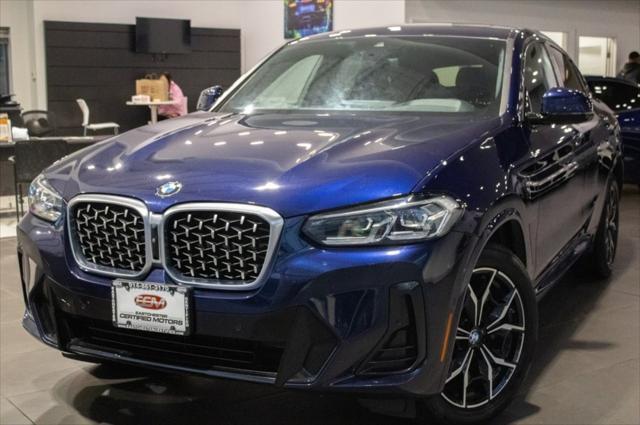 used 2022 BMW X4 car, priced at $34,135