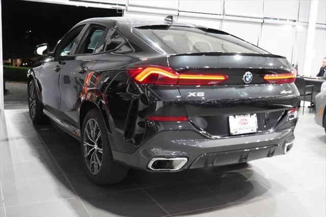 used 2023 BMW X6 car, priced at $45,488