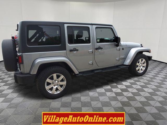 used 2013 Jeep Wrangler Unlimited car, priced at $16,990