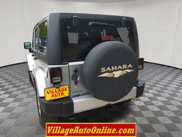 used 2013 Jeep Wrangler Unlimited car, priced at $16,990