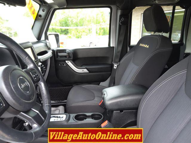 used 2013 Jeep Wrangler Unlimited car, priced at $16,990