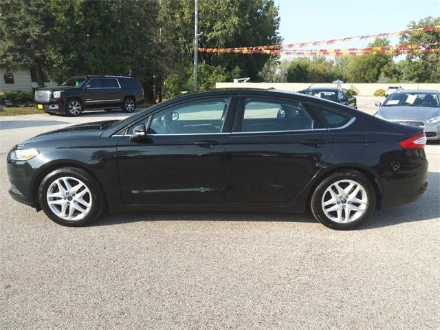 used 2014 Ford Fusion car, priced at $7,990