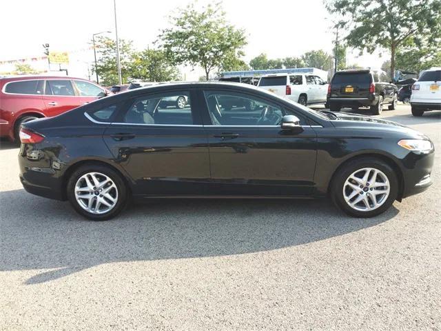 used 2014 Ford Fusion car, priced at $7,990