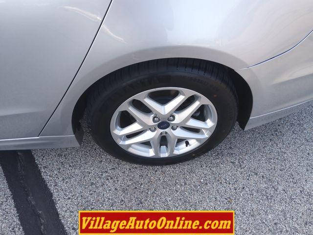 used 2016 Ford Fusion car, priced at $9,990