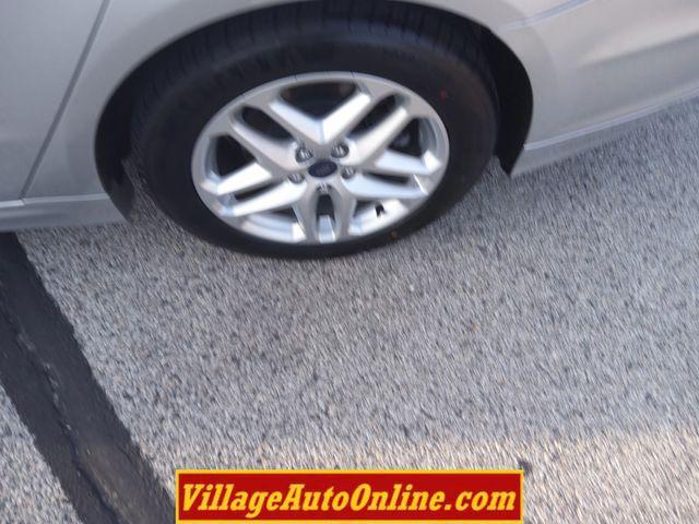 used 2016 Ford Fusion car, priced at $9,990