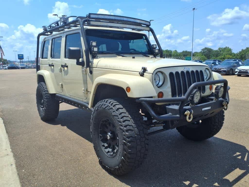 used 2011 Jeep Wrangler Unlimited car, priced at $14,899