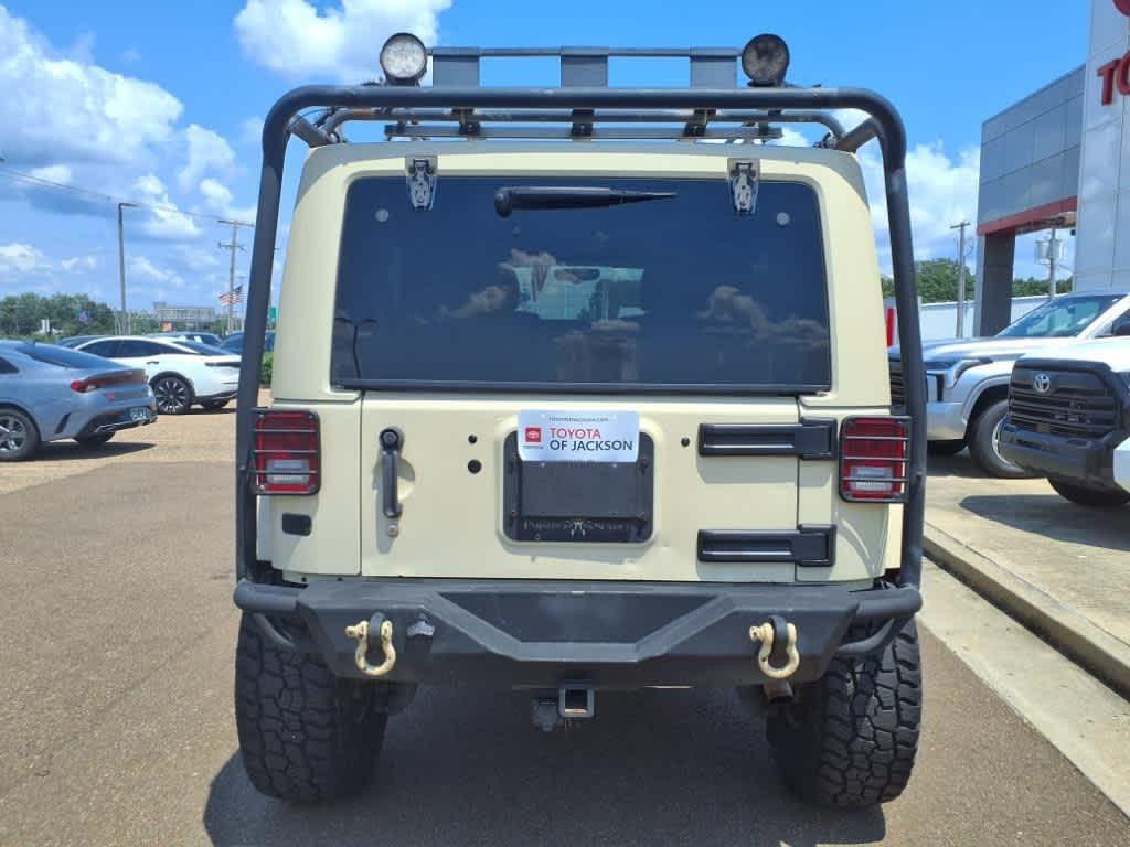 used 2011 Jeep Wrangler Unlimited car, priced at $14,899