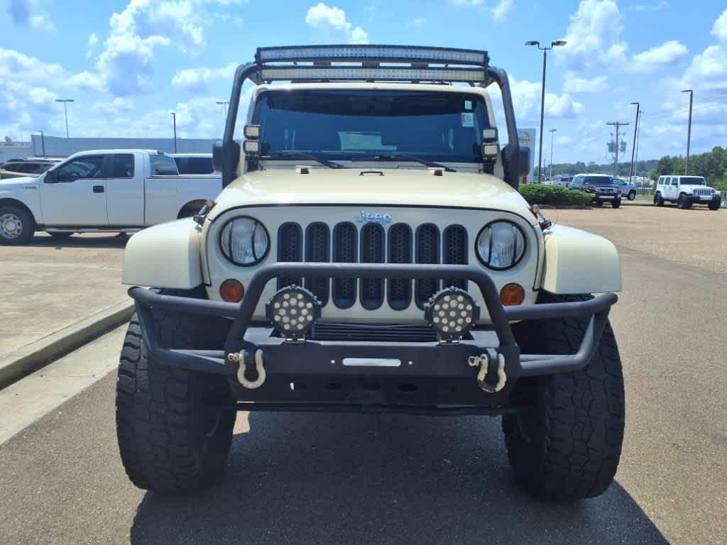 used 2011 Jeep Wrangler Unlimited car, priced at $14,899