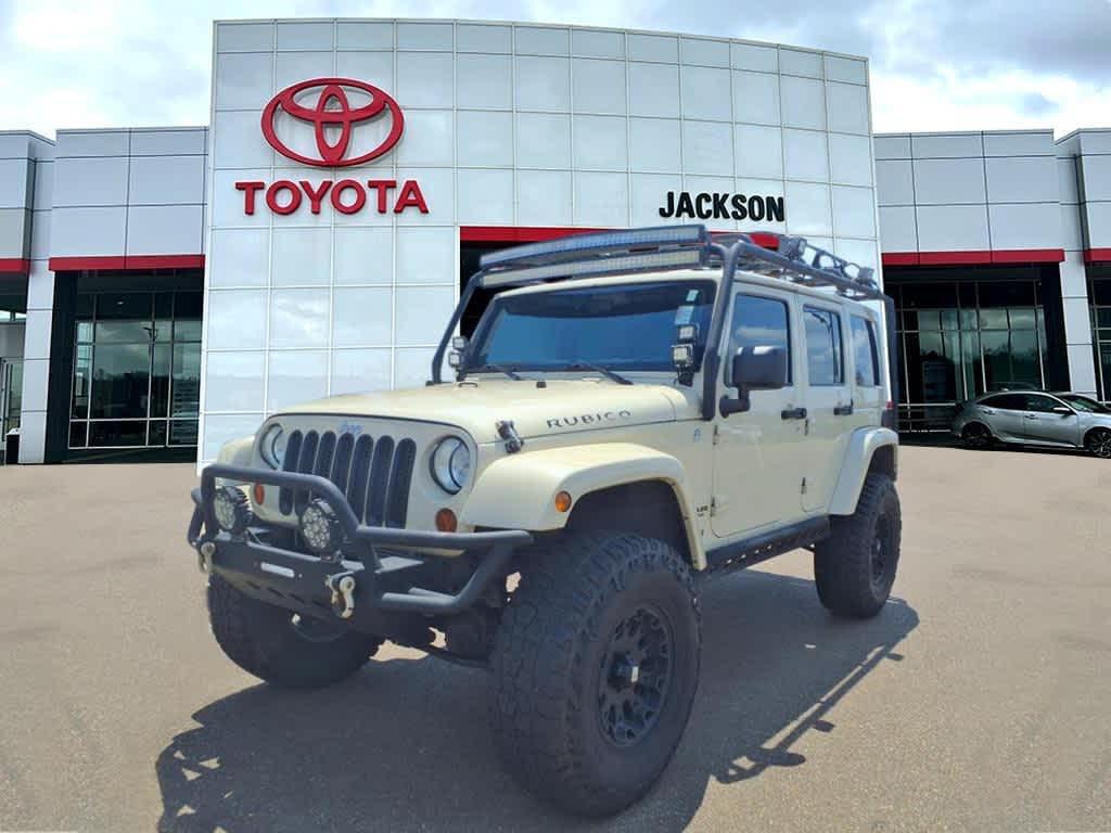 used 2011 Jeep Wrangler Unlimited car, priced at $14,899