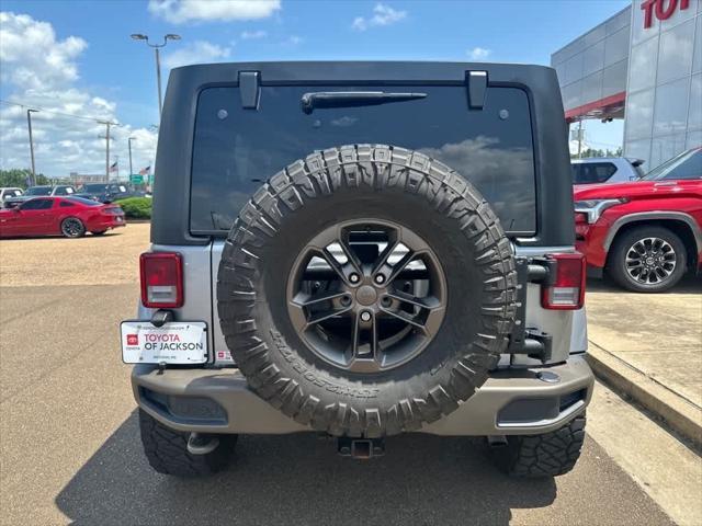used 2017 Jeep Wrangler Unlimited car, priced at $28,125
