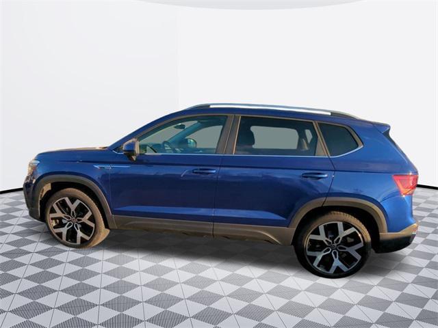 used 2023 Volkswagen Taos car, priced at $23,000