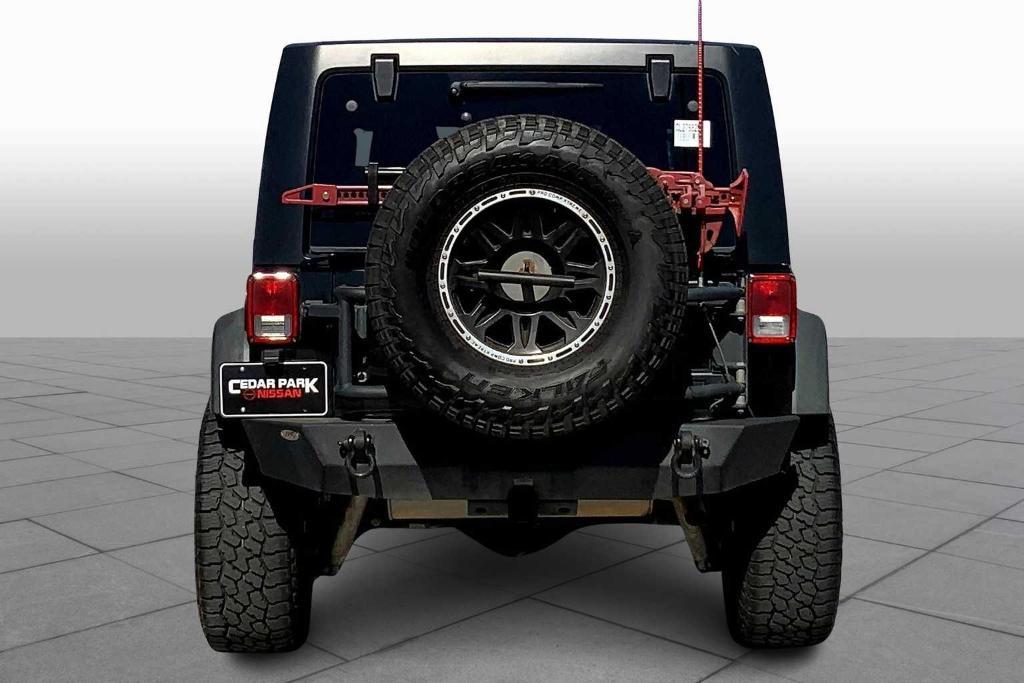 used 2012 Jeep Wrangler Unlimited car, priced at $16,932