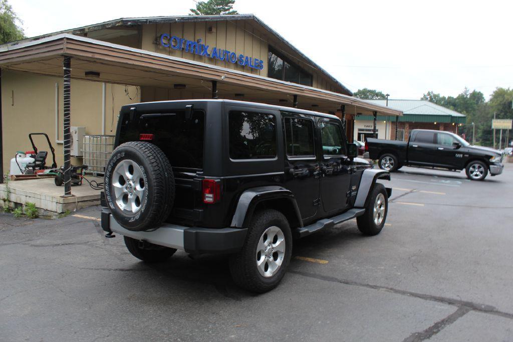 used 2015 Jeep Wrangler Unlimited car, priced at $15,677