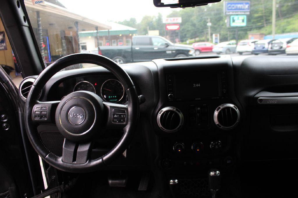 used 2015 Jeep Wrangler Unlimited car, priced at $15,677