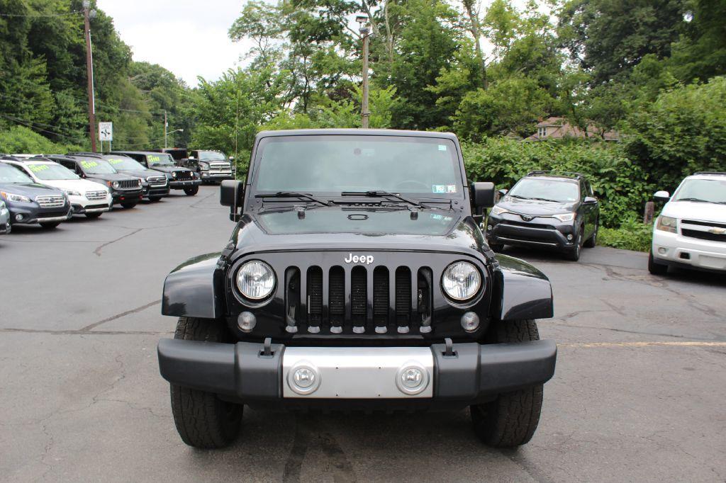 used 2015 Jeep Wrangler Unlimited car, priced at $15,677