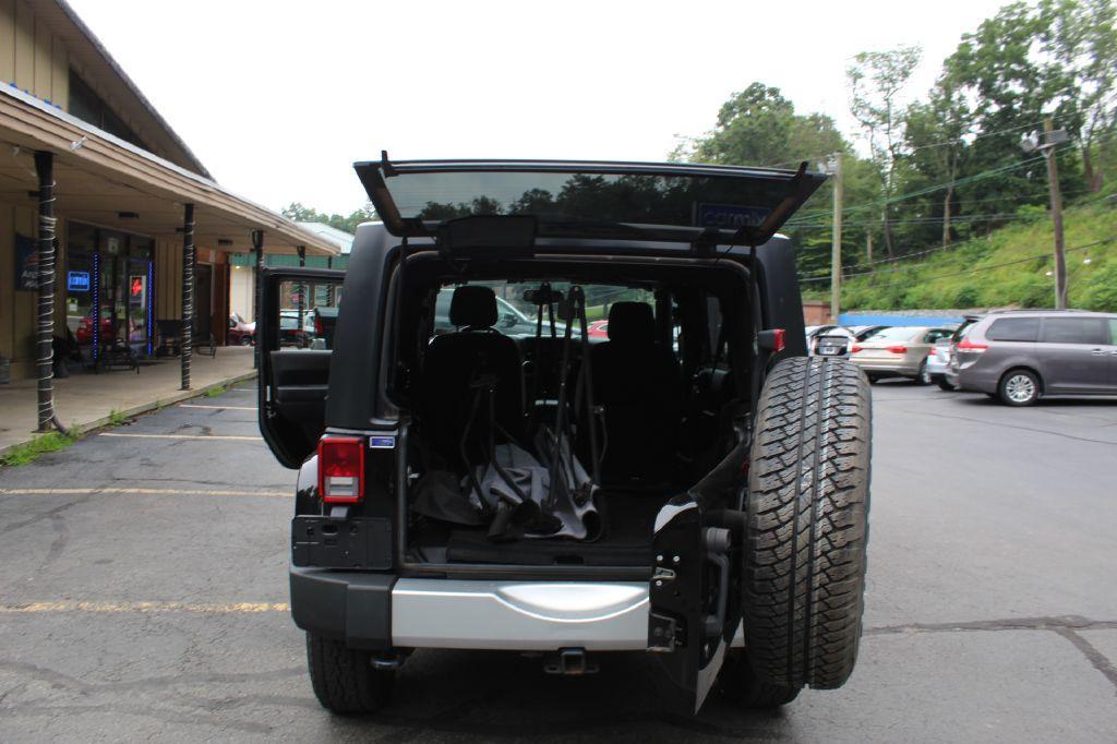 used 2015 Jeep Wrangler Unlimited car, priced at $15,677