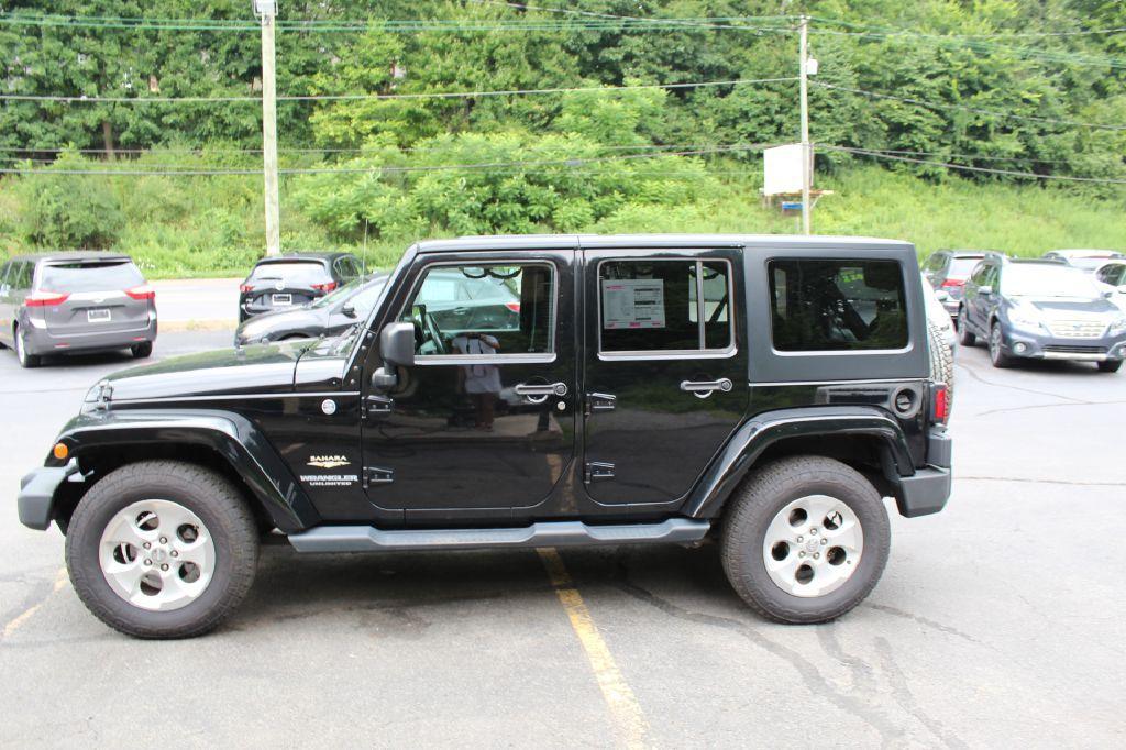 used 2015 Jeep Wrangler Unlimited car, priced at $15,677