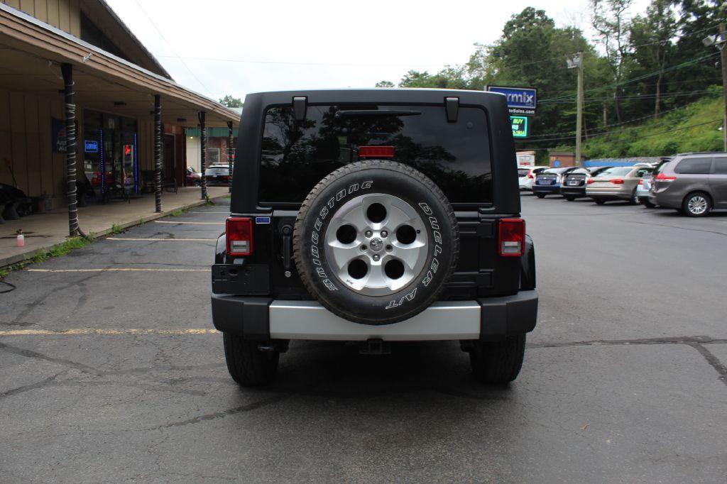 used 2015 Jeep Wrangler Unlimited car, priced at $15,677