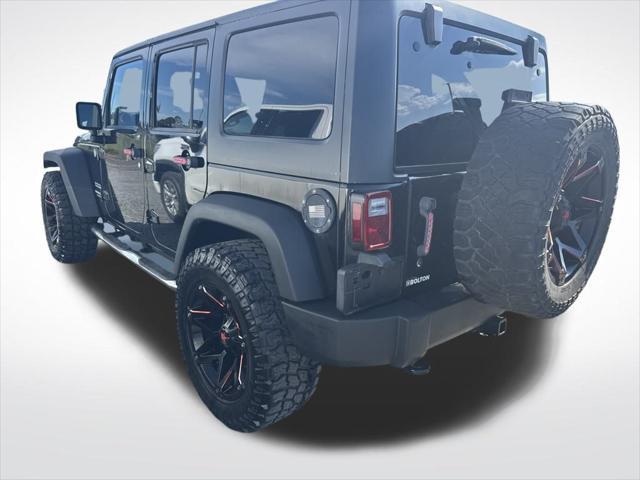 used 2014 Jeep Wrangler Unlimited car, priced at $15,400