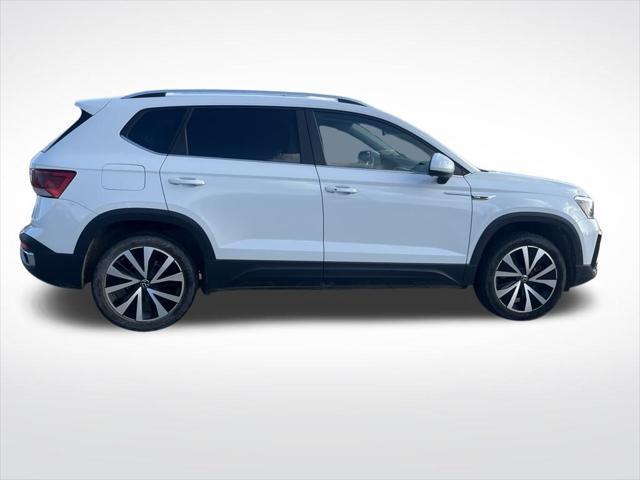 used 2023 Volkswagen Taos car, priced at $25,000