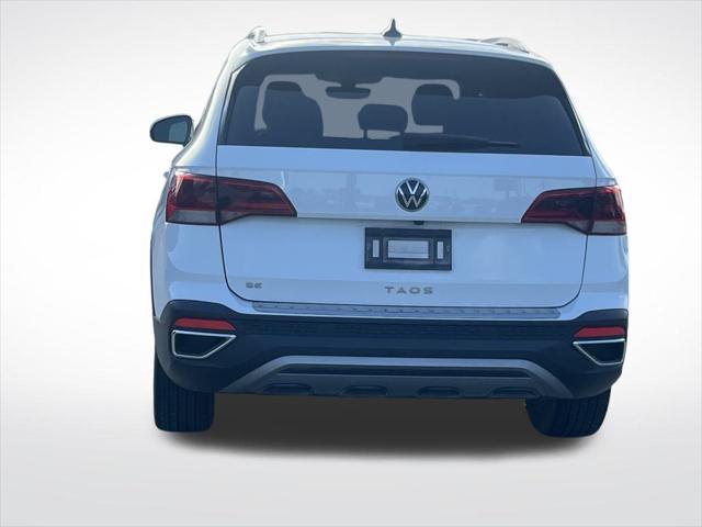 used 2023 Volkswagen Taos car, priced at $25,000