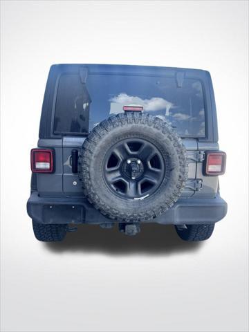 used 2023 Jeep Wrangler car, priced at $27,700
