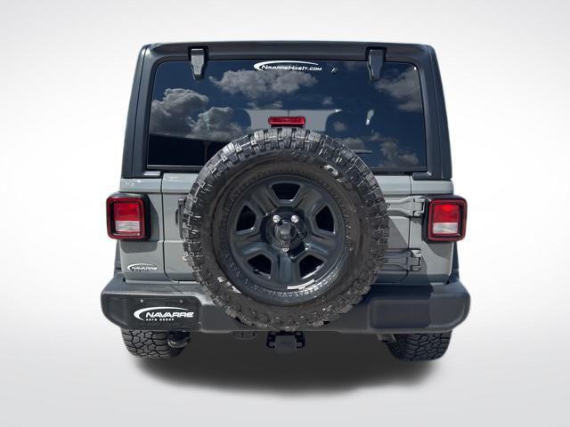 used 2023 Jeep Wrangler car, priced at $26,900