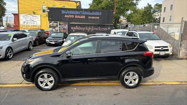 used 2014 Toyota RAV4 car, priced at $12,999