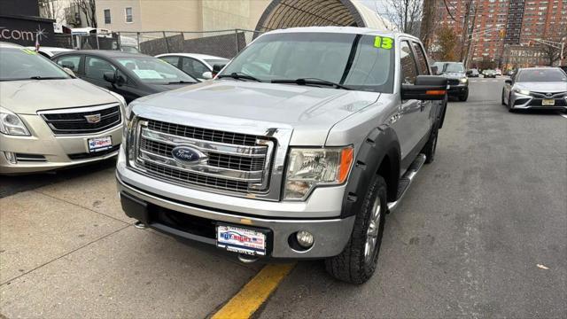 used 2013 Ford F-150 car, priced at $10,999