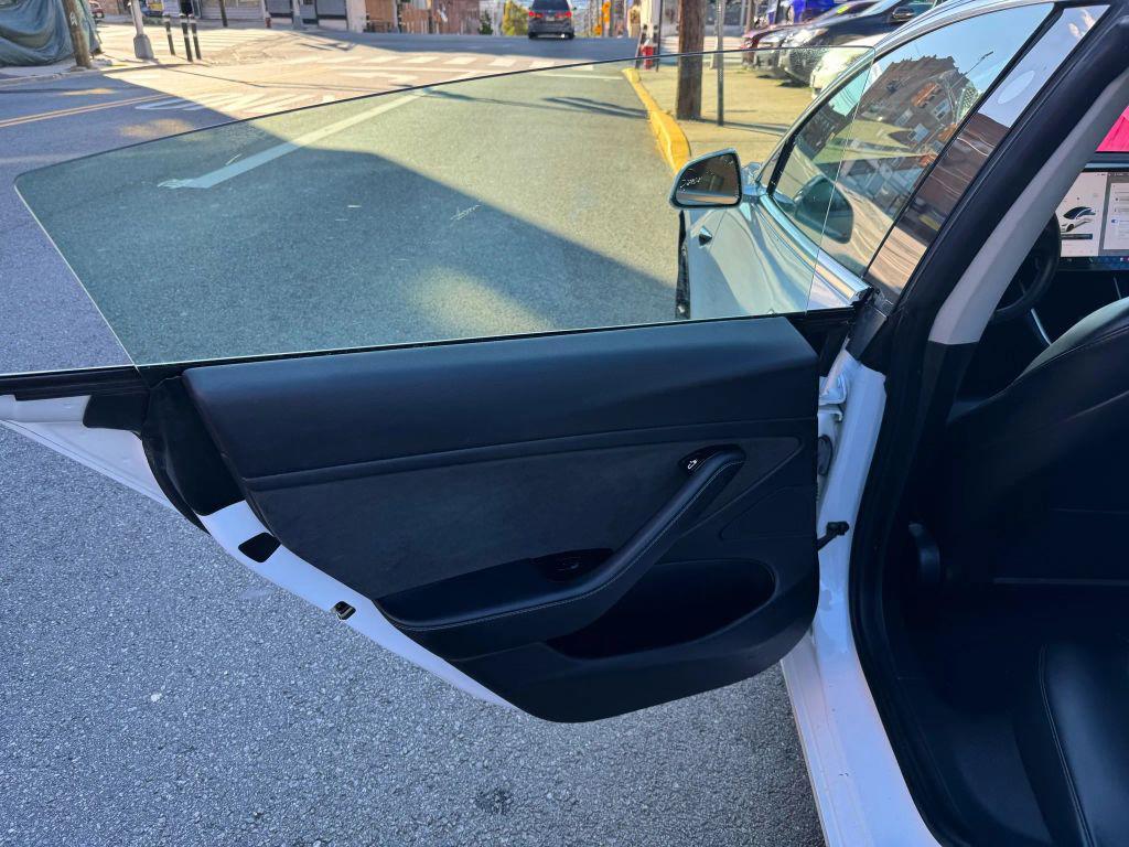 used 2020 Tesla Model 3 car, priced at $16,999