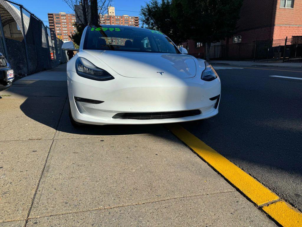 used 2020 Tesla Model 3 car, priced at $16,999