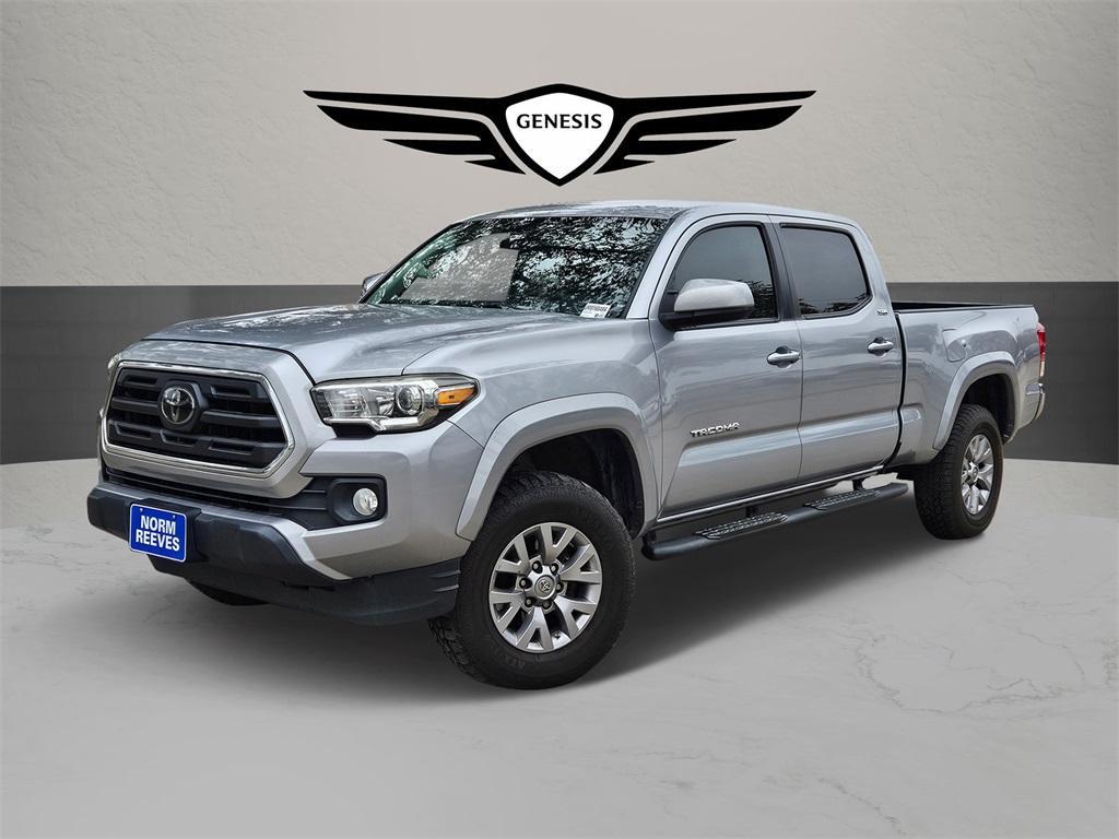 used 2018 Toyota Tacoma car, priced at $19,700