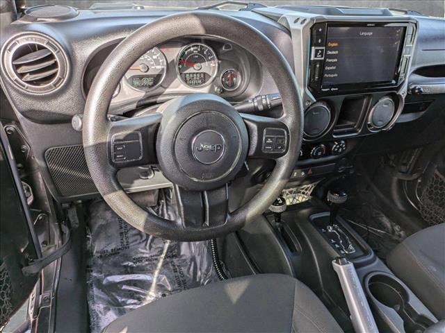 used 2016 Jeep Wrangler Unlimited car, priced at $21,991