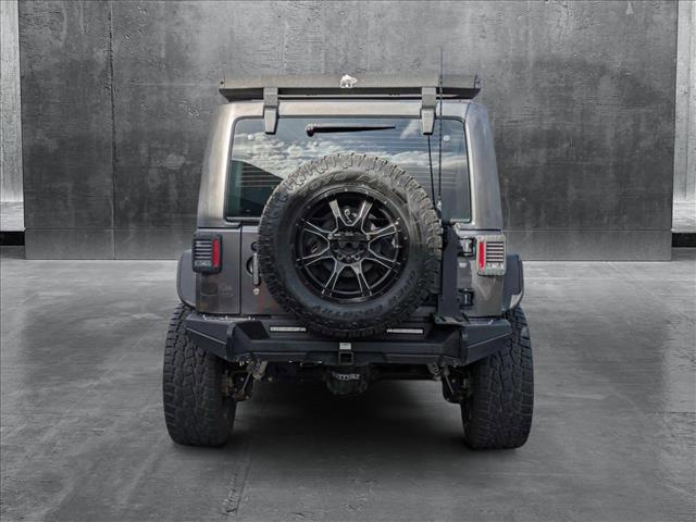 used 2016 Jeep Wrangler Unlimited car, priced at $21,991