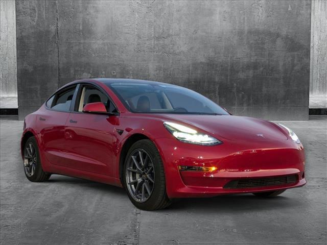 used 2023 Tesla Model 3 car, priced at $27,899