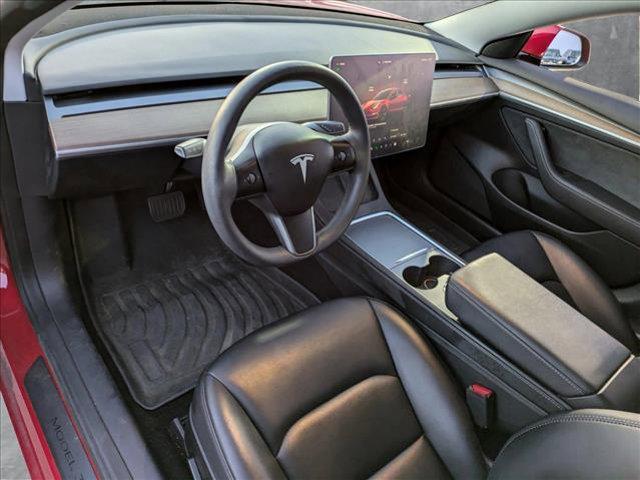 used 2023 Tesla Model 3 car, priced at $27,899