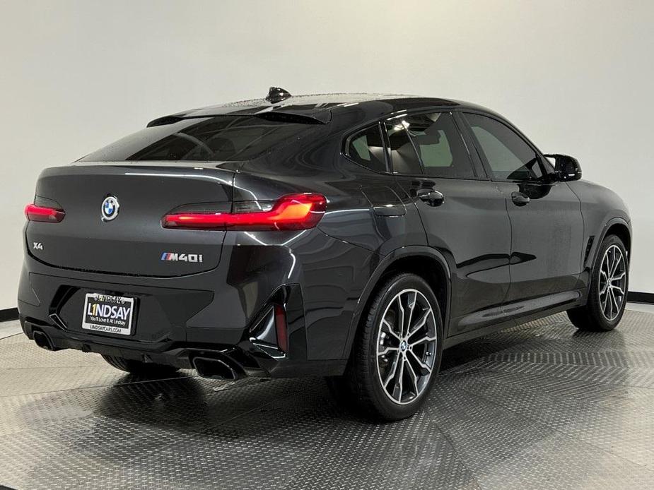 used 2023 BMW X4 car, priced at $56,500