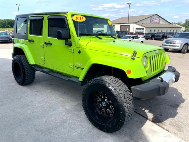 used 2013 Jeep Wrangler Unlimited car, priced at $13,995