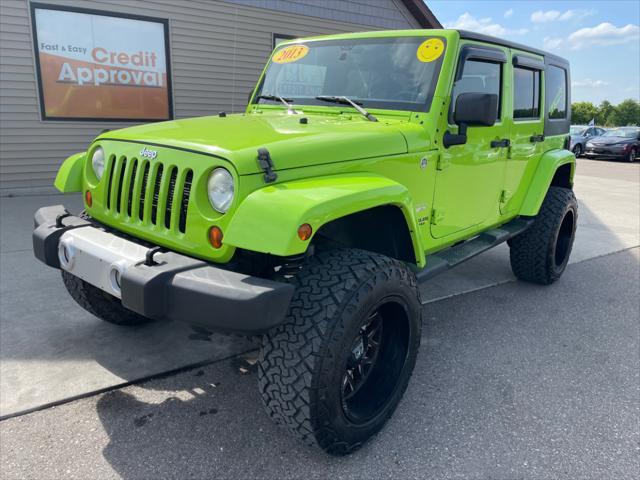 used 2013 Jeep Wrangler Unlimited car, priced at $13,995