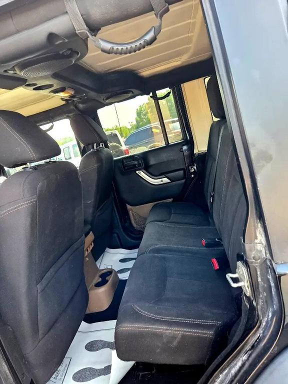 used 2014 Jeep Wrangler Unlimited car, priced at $12,995